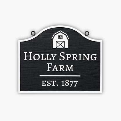A Custom Carved Farm Sign & Ranch Sign – Engraved PVC Sign for Barns and Country Homes, in black and white with a barn icon, reads Holly Spring Farm Est. 1877.