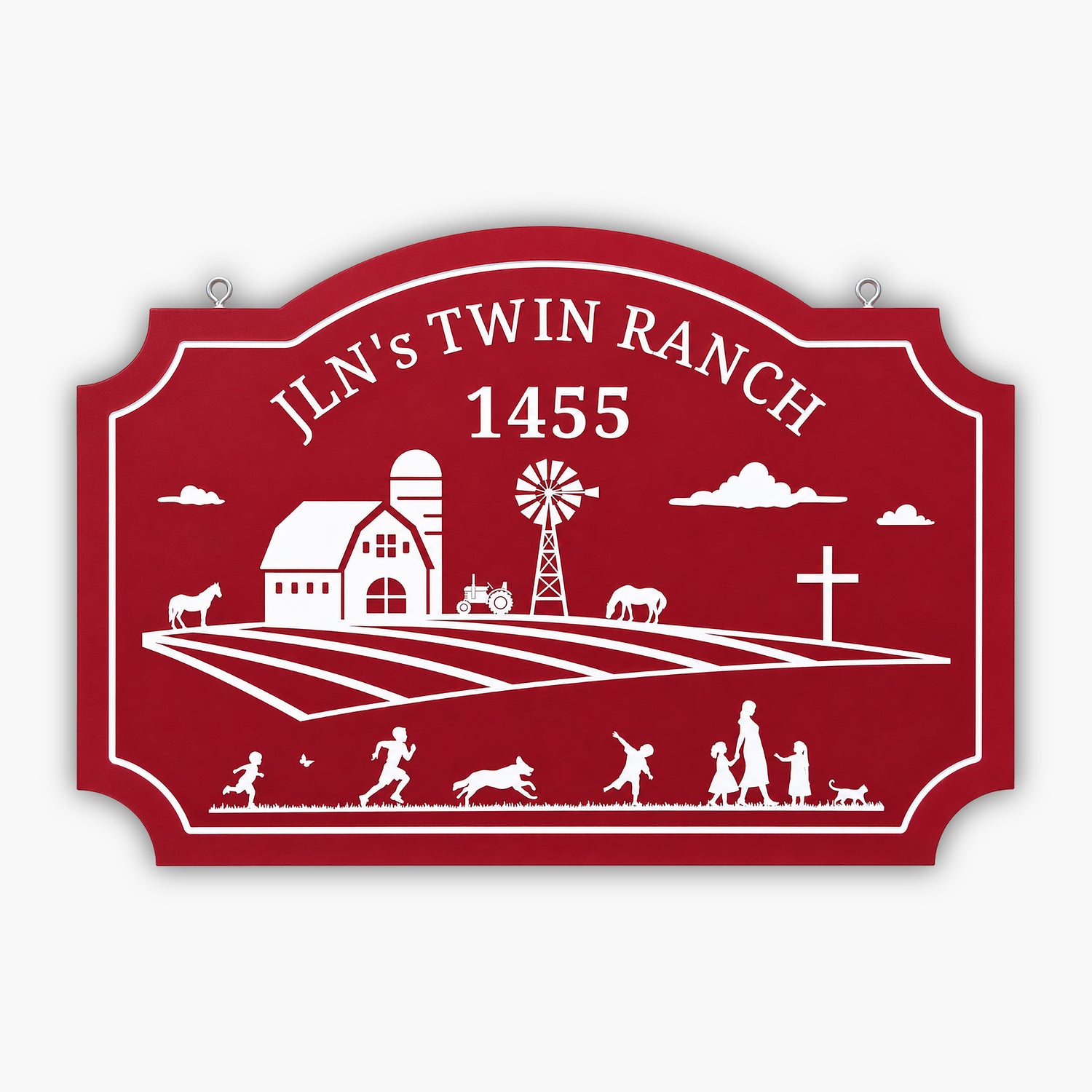 A red ranch sign reads JLNs TWIN RANCH 1455 and features silhouettes of a barn, windmill, tractor, horse, cross, and a family with children, dog, and cat in a field.