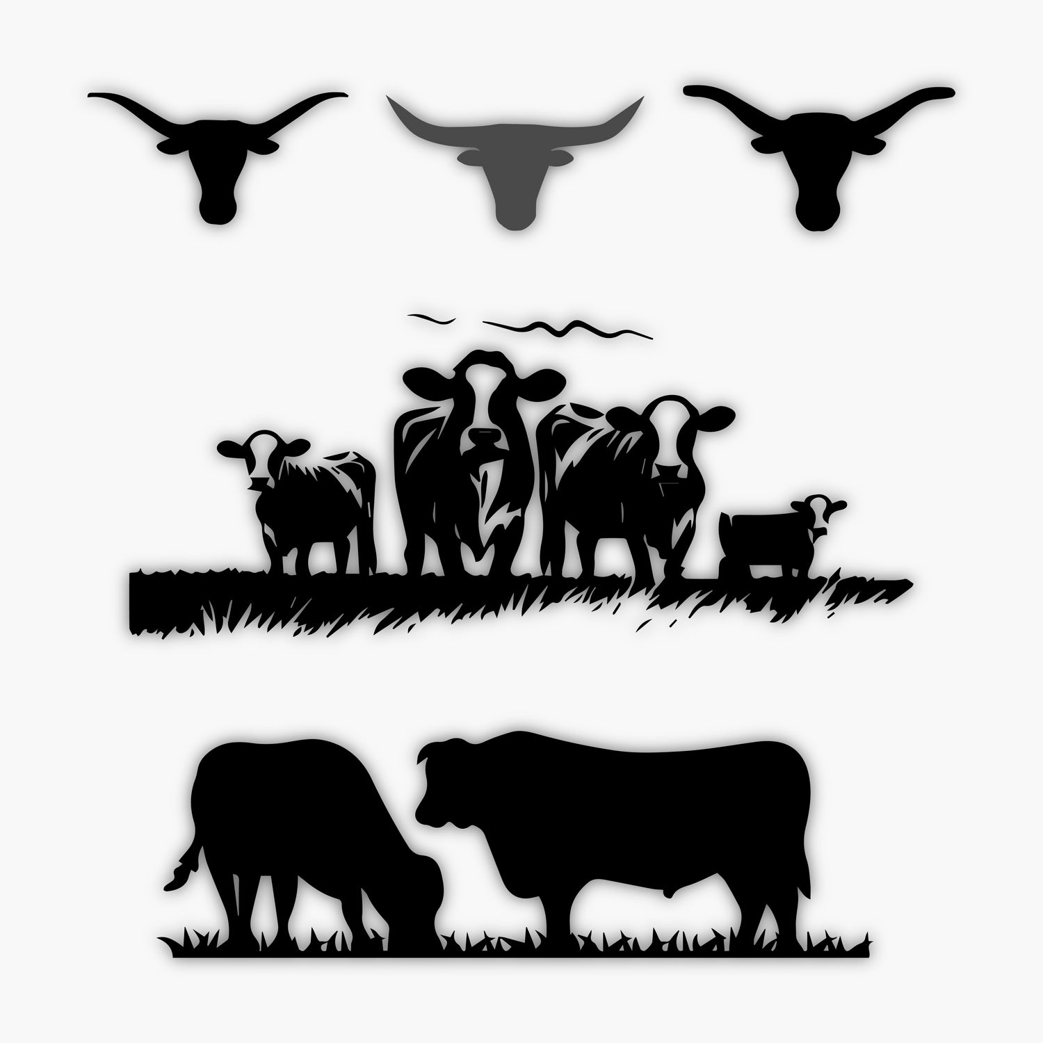 A set of black silhouettes featuring three bull heads, a group of cows and calves standing in grass, and two cows grazing—ideal as sample design elements for creative projects.