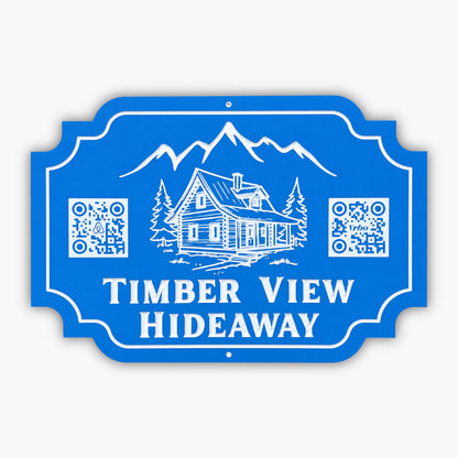 A blue Custom QR Code Sign with white line art of a cabin, pine trees, and mountains reads Timber View Hideaway, featuring two QR codes—ideal as VRBO Decor or an Airbnb Sign. Product: Custom QR Code Sign Personalized Sign VRBO Decor Airbnb Sign STR Rental Sign.