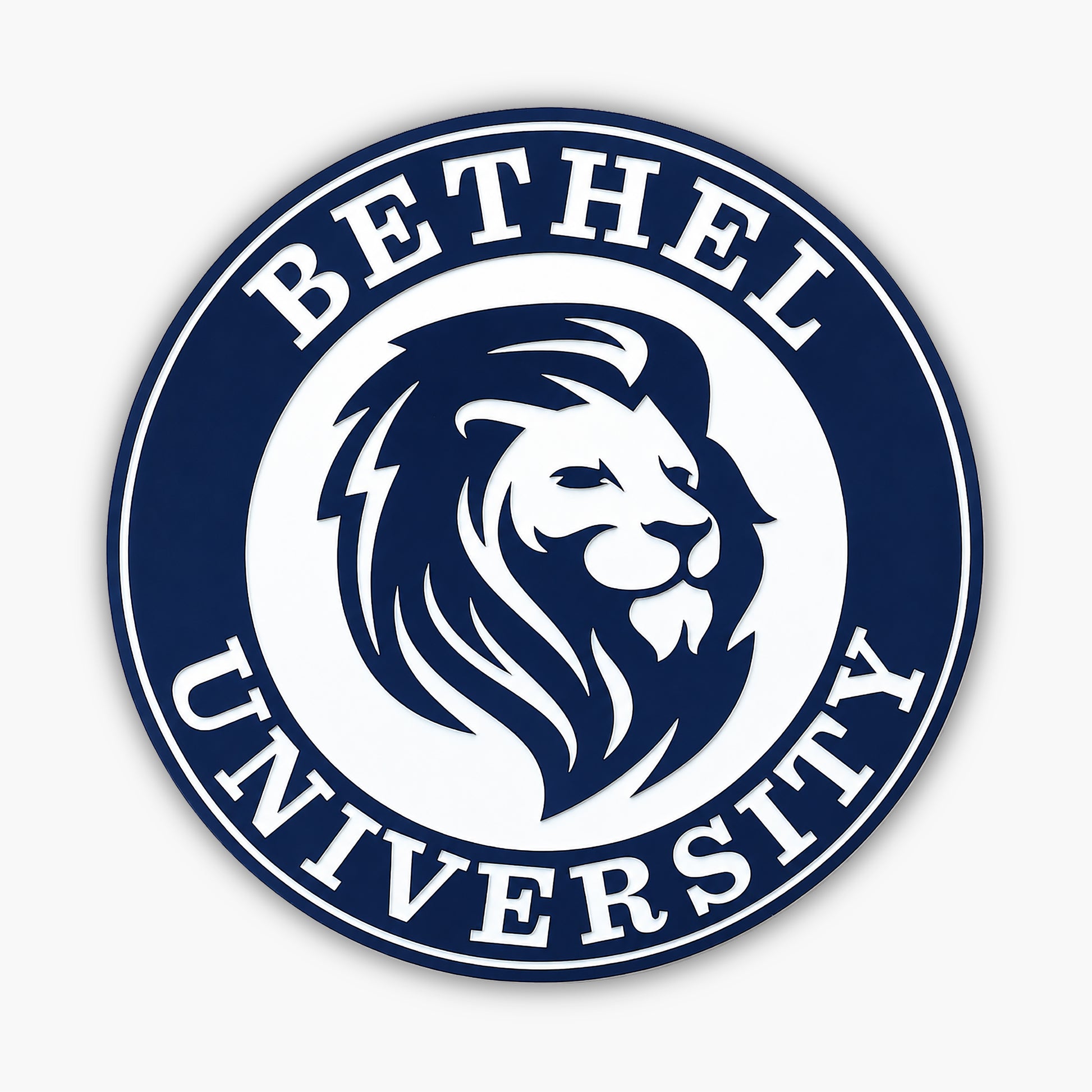 The logo of Bethel University, akin to Personalized Oval Custom Beach House Signs Coastal Decor, displays a stylized lions head in profile within a circular border. Bethel University is boldly etched around the edge in capital letters, with blue and white as the primary design palette.