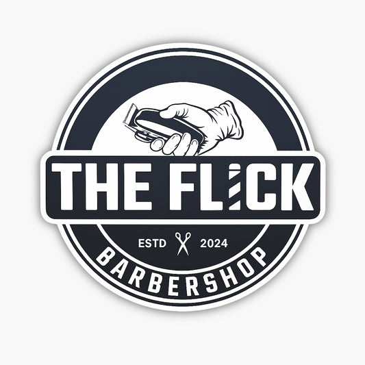 A round black and white barbershop logo with a hand holding hair clippers above the text THE FLICK. Below are ESTD, scissors icon, 2024, and the word BARBERSHOP around the bottom rim.