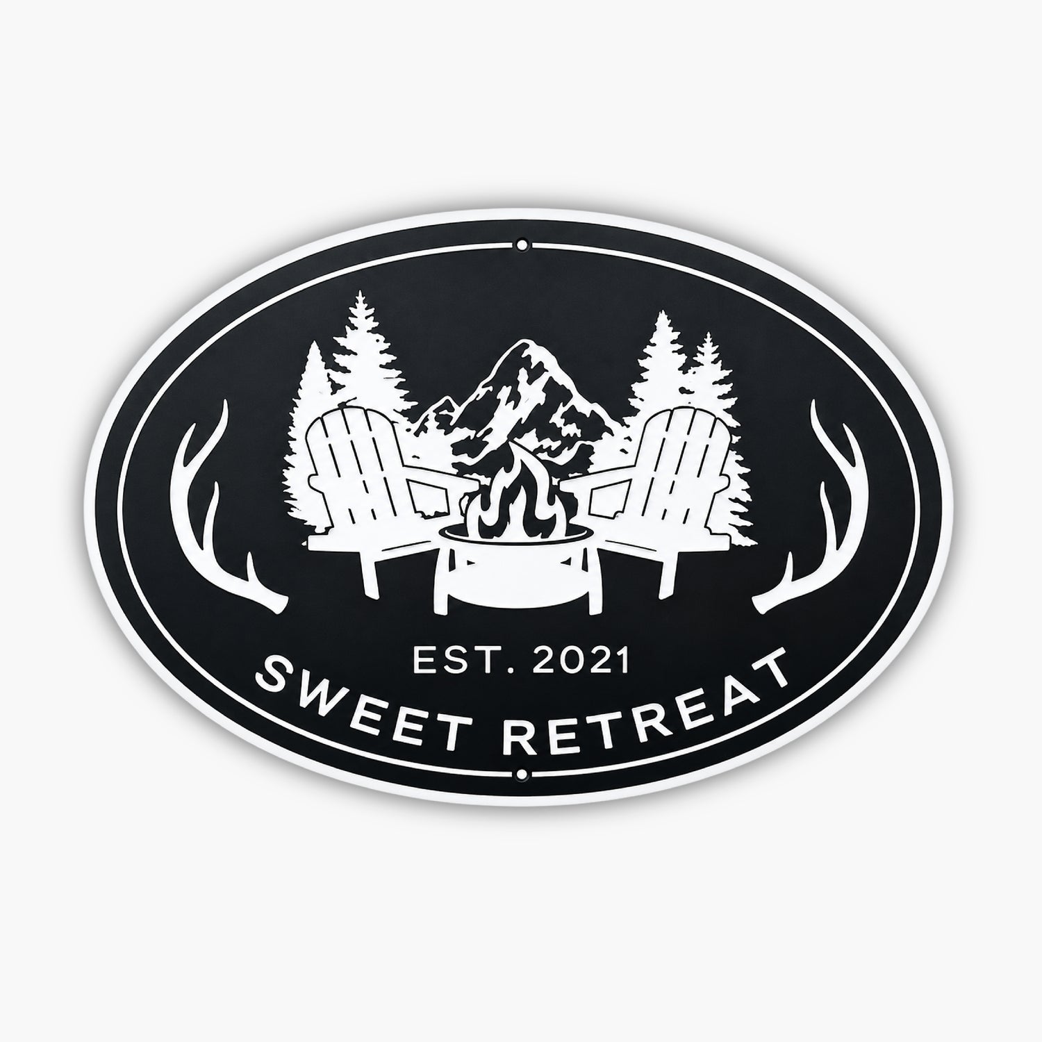 A black and white sign that says sweet retreat.